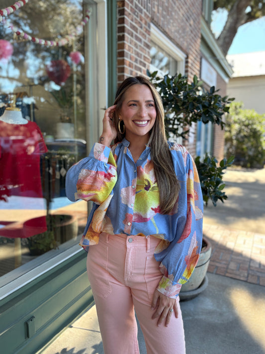 floral blue top with pink and white flowers