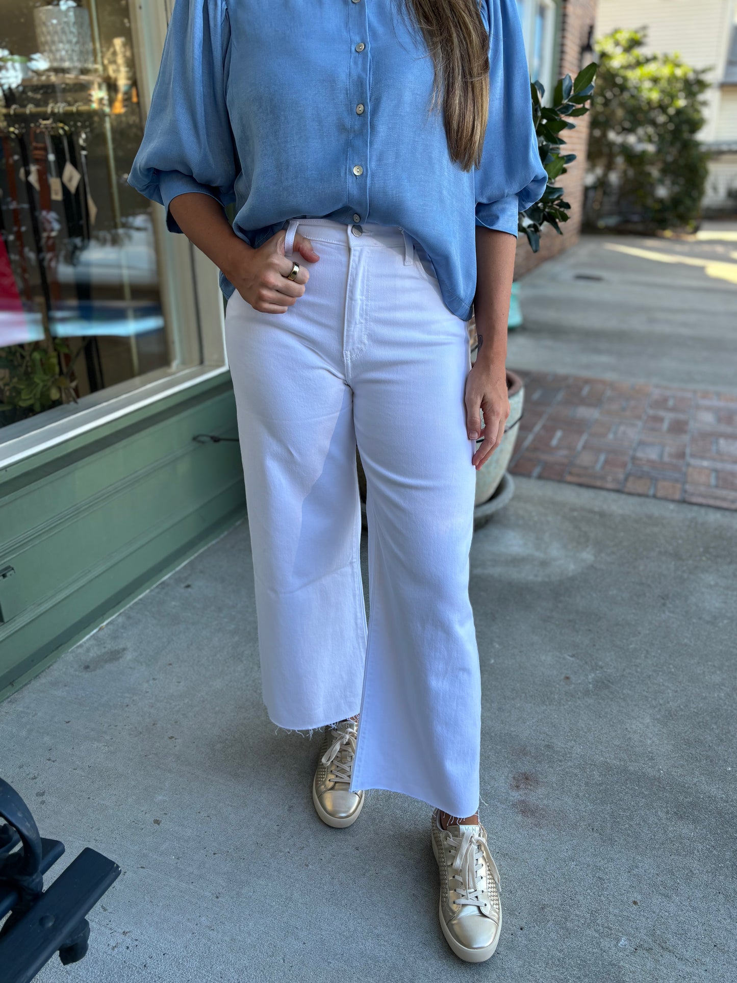 white denim cropped jeans with unfinished hem