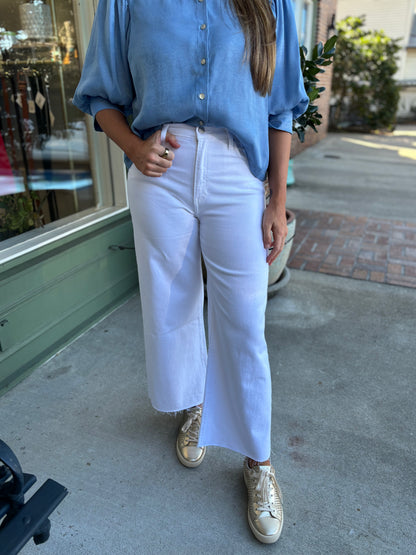 white denim cropped jeans with unfinished hem