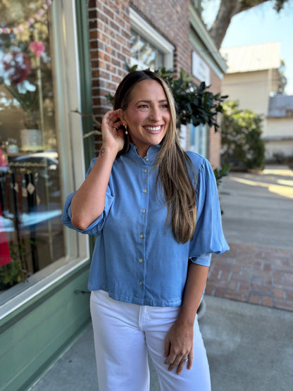 chambray top with ruffle collar and cuff sleeve detail