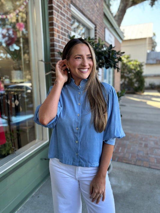 chambray top with ruffle collar and cuff sleeve detail