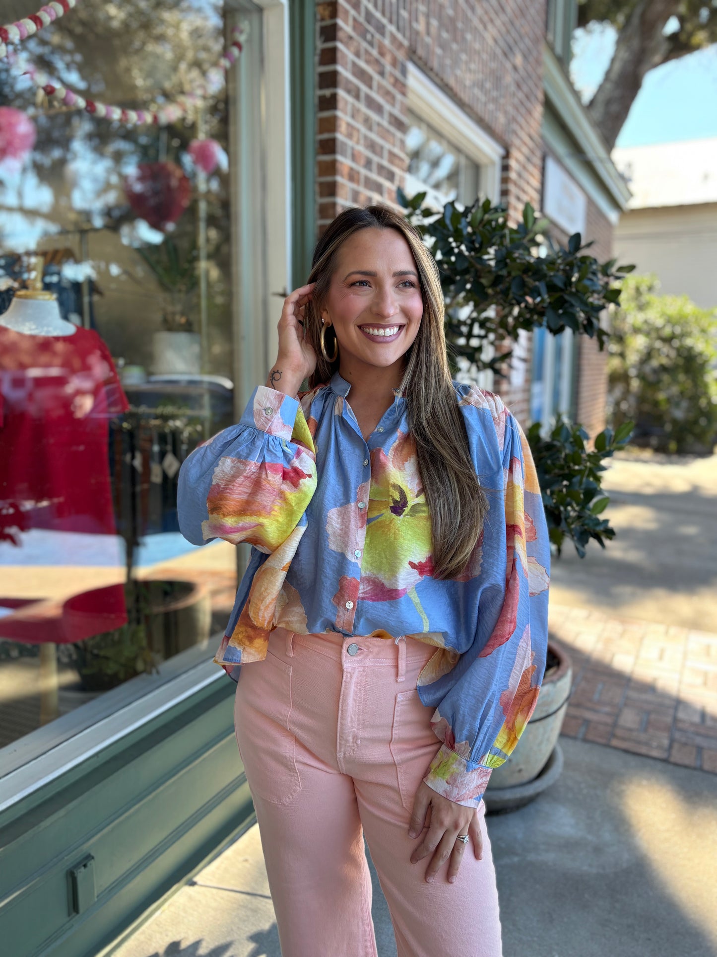 floral blue top with pink and white flowers